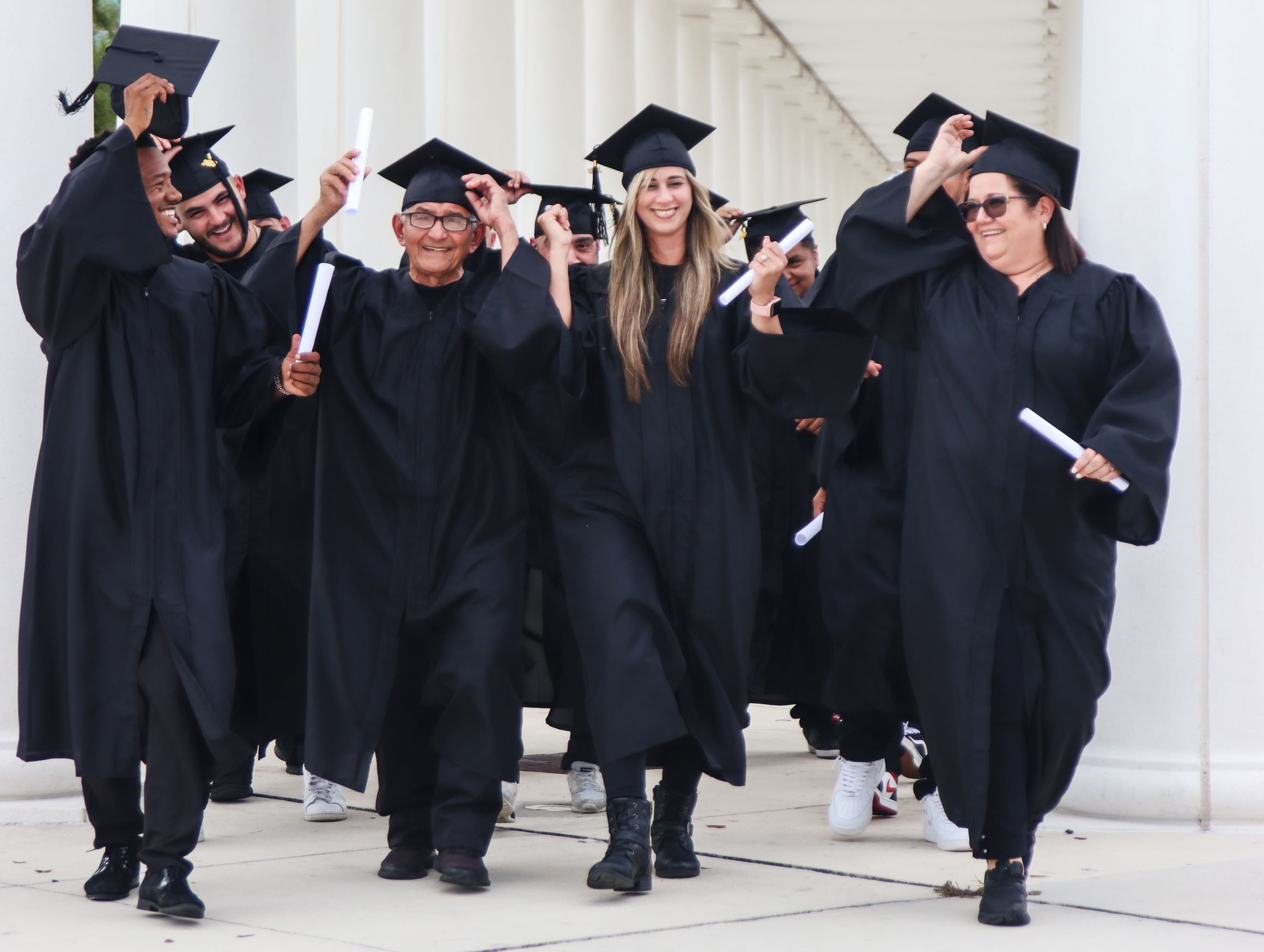 A group of students wearing graduation robes and hats